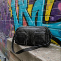Bolso negro Y2K multibolsillos con detalles metálicos y correa ajustable