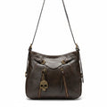 Bolso marrón oscuro Y2K con calavera y herrajes oro viejo