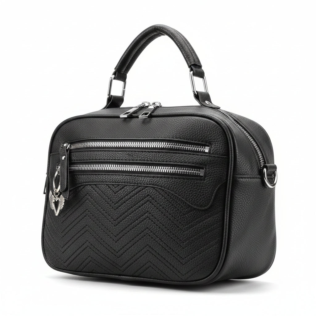 Bolso negro Y2K con corazón alado y detalles metálicos