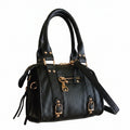 Bolso Y2K con corazón y detalles dorados disponible en negro y beige